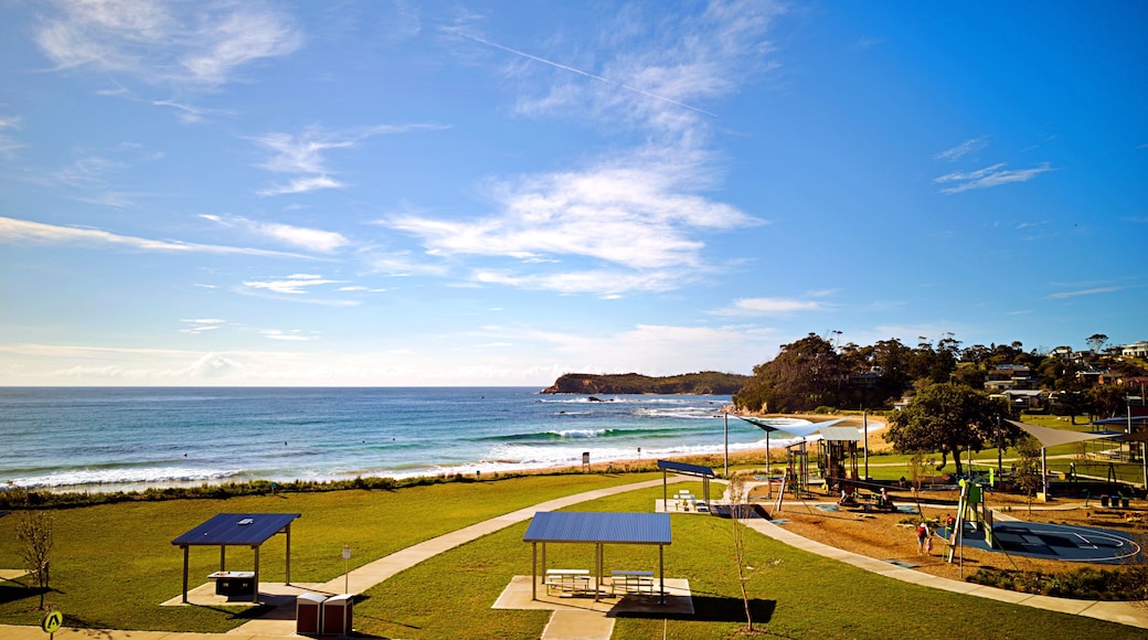 Malua Bay on South Coast NSW Australia. Yellow colour sandy beach. Lifeguards. Seating. Rescue. Views to the ocean.