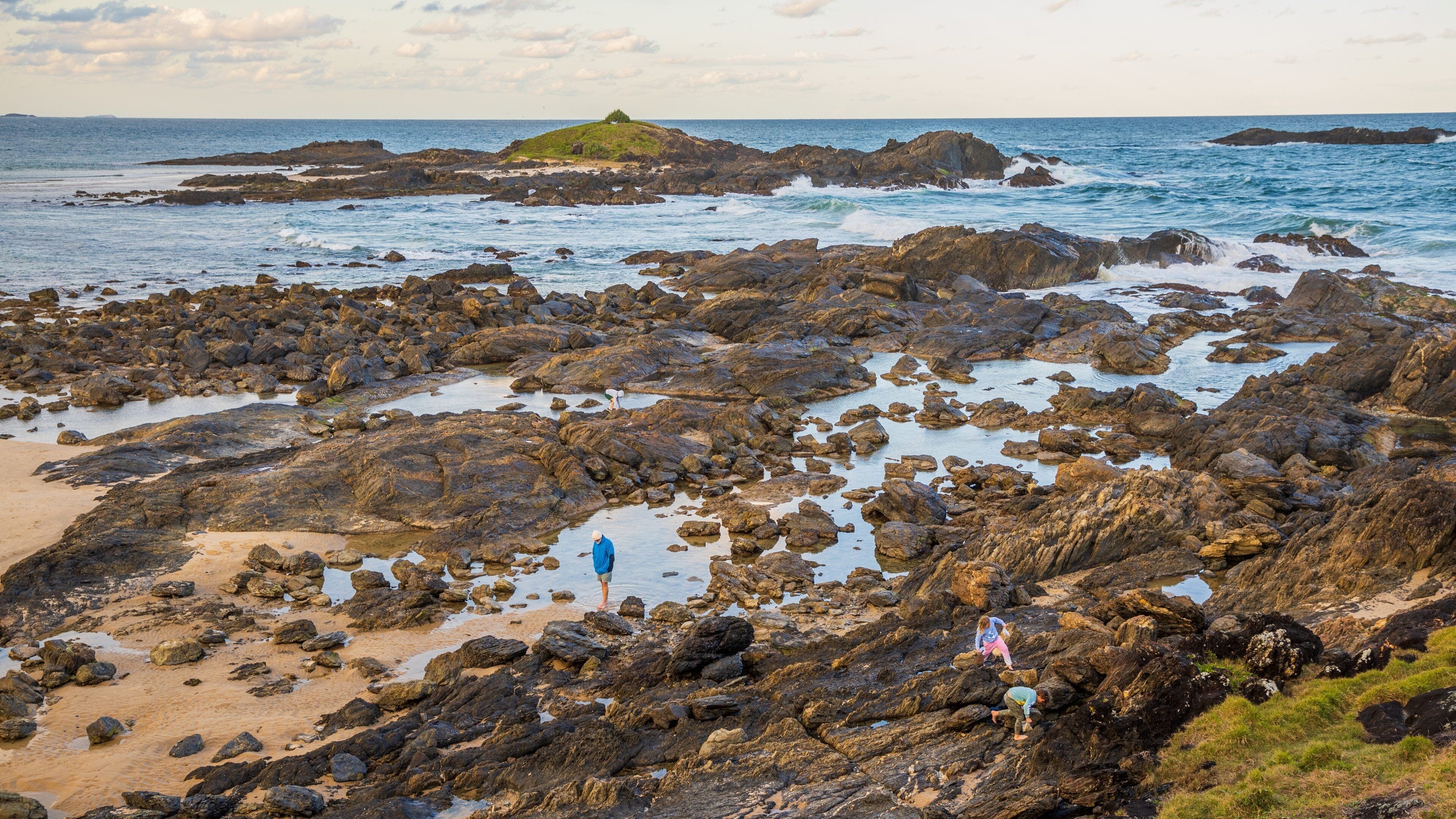 Sawtell which includes general coastal views and rocky coastline
