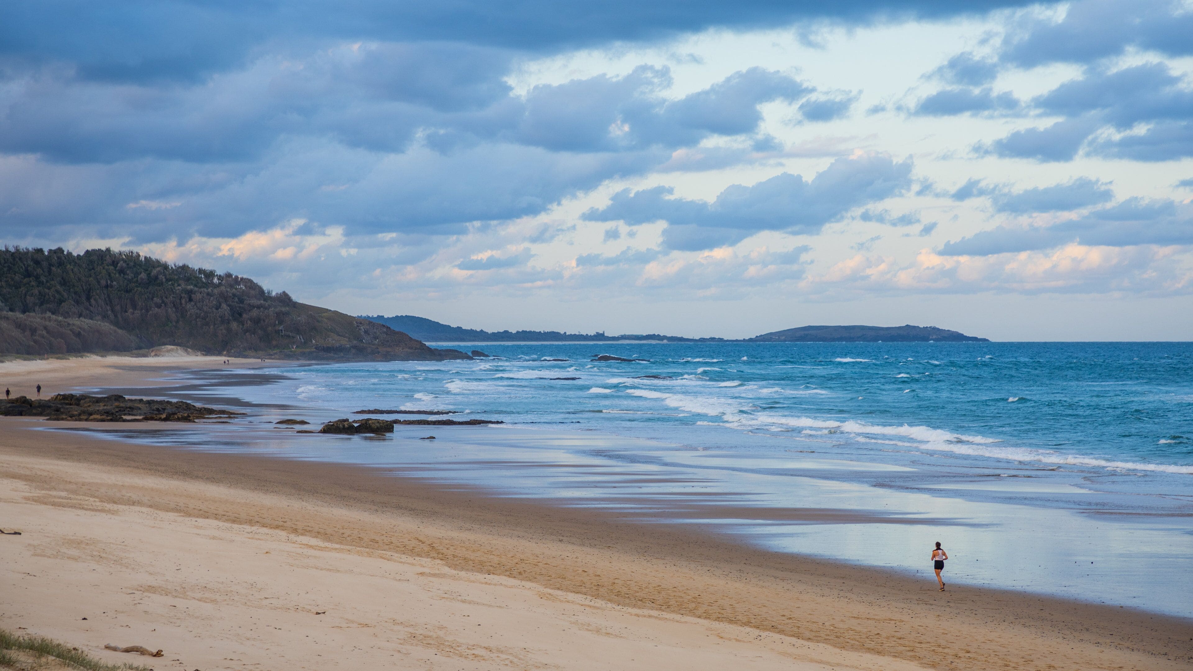 Sawtell featuring a sunset, a beach and general coastal views