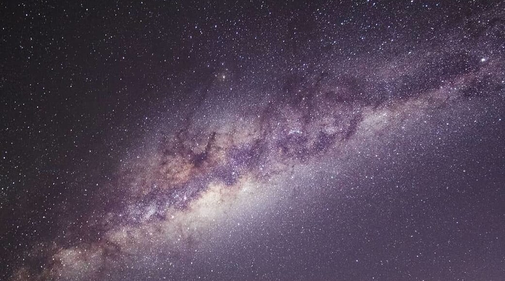 Shooting astro at South Stradbroke Island over the weekend and the weather conditions couldn't have been better for capturing the Milky Way. I got this shot early in the evening as the Milky Way rose above the ocean and I thought I'd give the image some scale by standing on the small sand dune with a light.