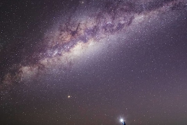 Shooting astro at South Stradbroke Island over the weekend and the weather conditions couldn't have been better for capturing the Milky Way. I got this shot early in the evening as the Milky Way rose above the ocean and I thought I'd give the image some scale by standing on the small sand dune with a light.