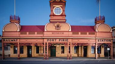 A historic railway station with a clock tower, labeled 'Port Pirie Museum Station'.