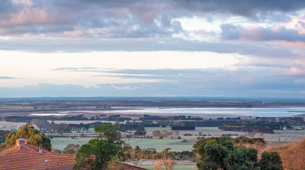 Rooftop sunset - high angle view of farm land by the lake, at sunset, in a small rural town, Camperdown, Victoria, Australia