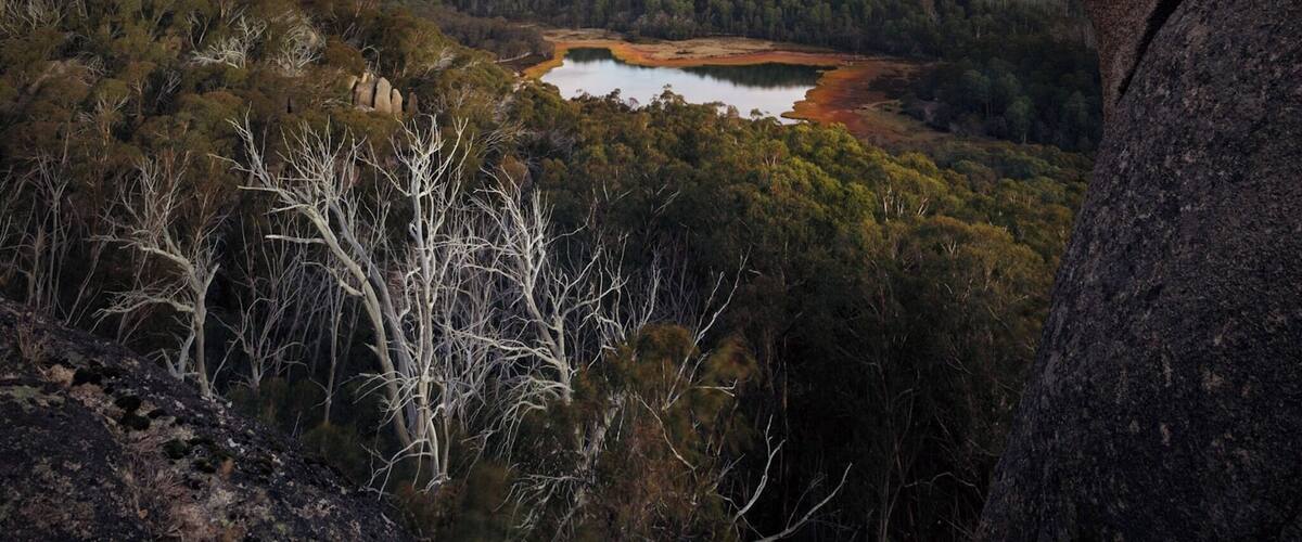 The view over Lake Catani from the Monolith on Mount Buffalo. The hike in is about 15mins from the road, make sure to bring a torch for sunrise/sunset and sturdy shoes. It is a high vantage point with no railings, so care is required, but the views are well worth it.