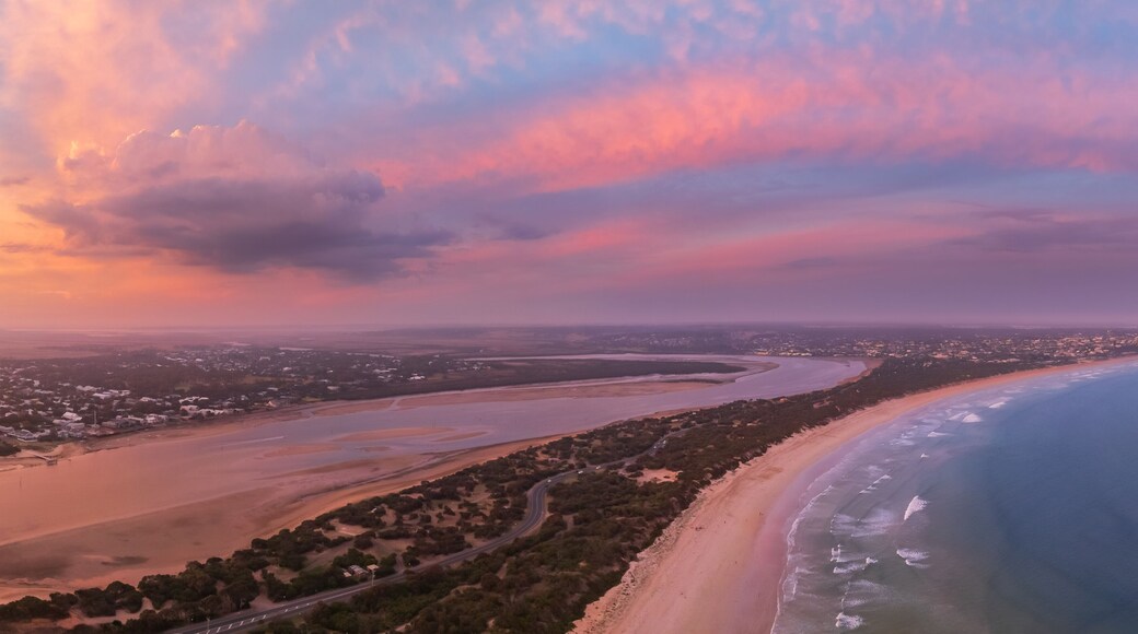 Colorful sunset over coastal river and beaches