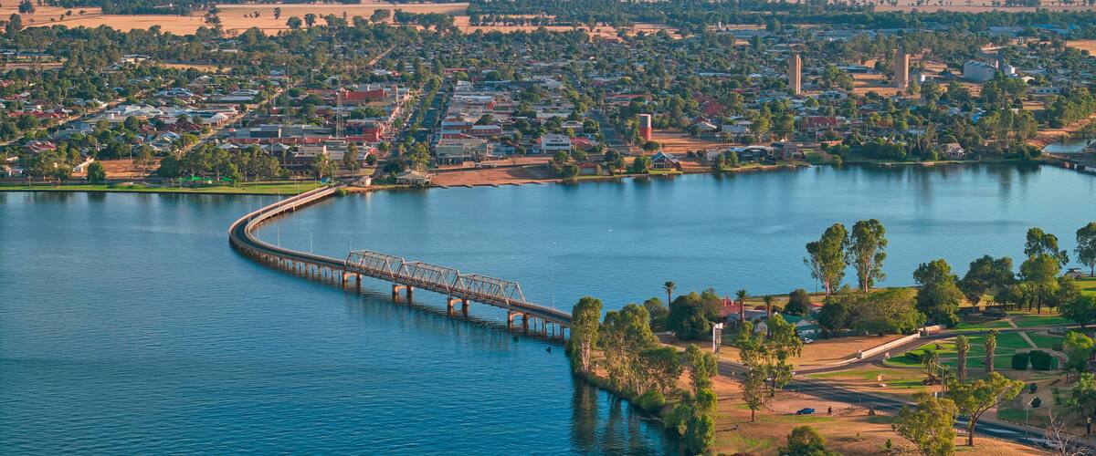 Aerial view of the curved bridge of Lake Mulwala with Yarrawonga beyond