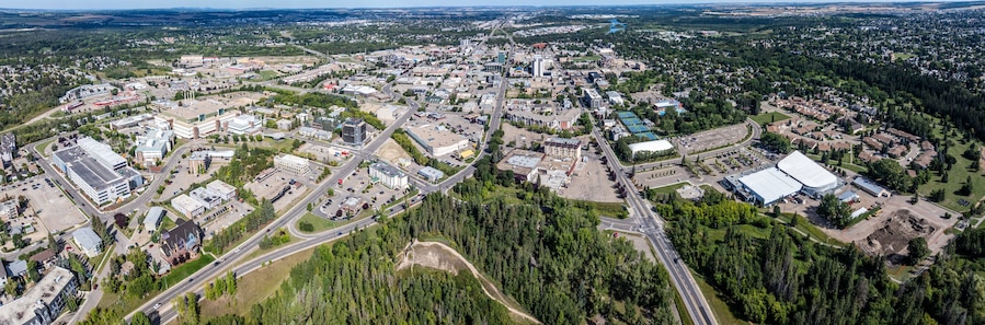 panoramic aerial landscape view of the Downtown area in Red Deer City, Alberta, Canada with streets and infrastructure. The City is located at Red Deer River between Edmonton and Calgary
