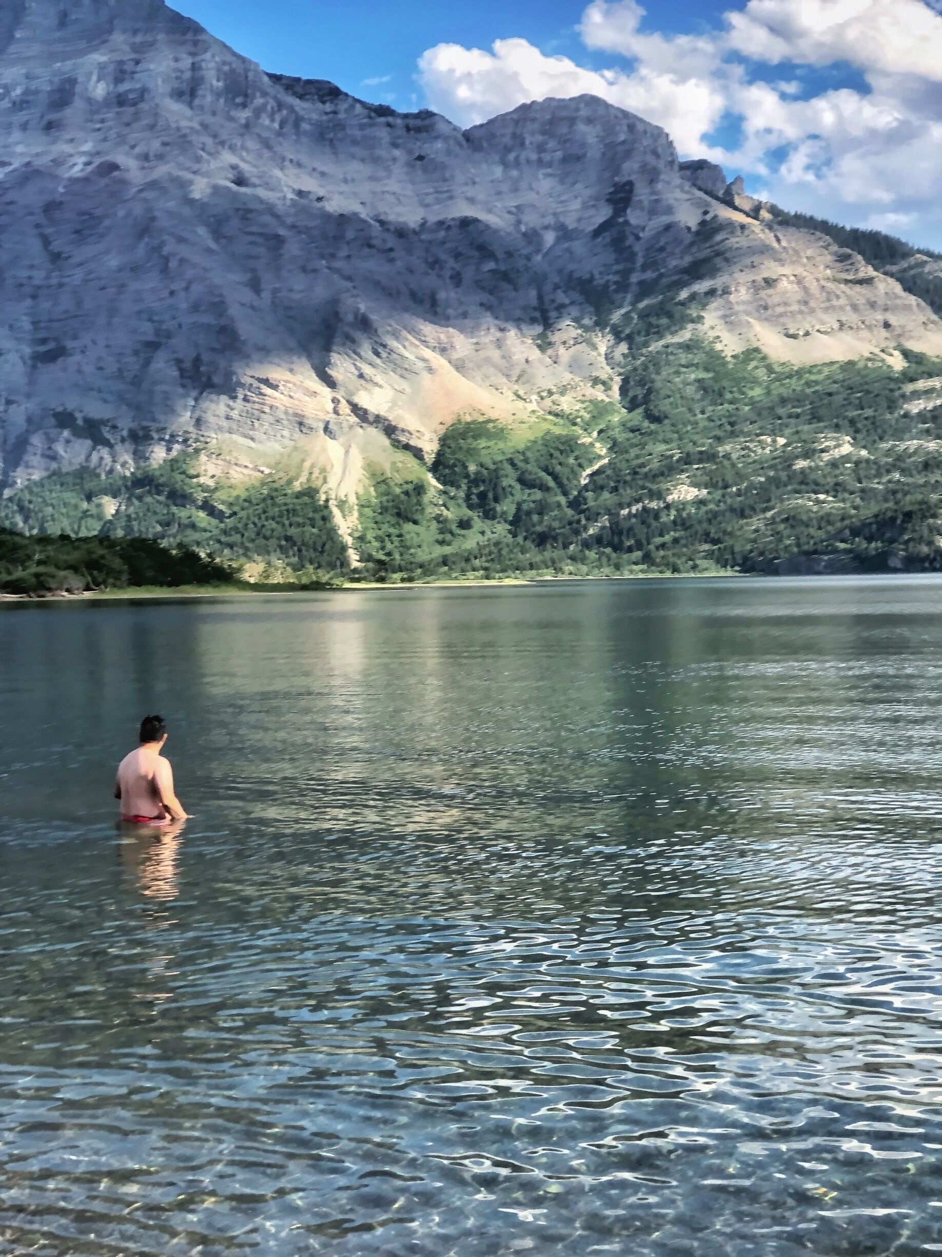 This guy went swimming in the freezing water of Waterton Lake