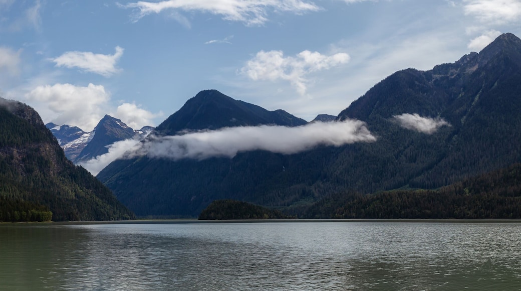 Beautiful Panoramic View of Mud Lake with Mountains in the background. Taken in Blue River, North of Kamloops, British Columbia, Canada.