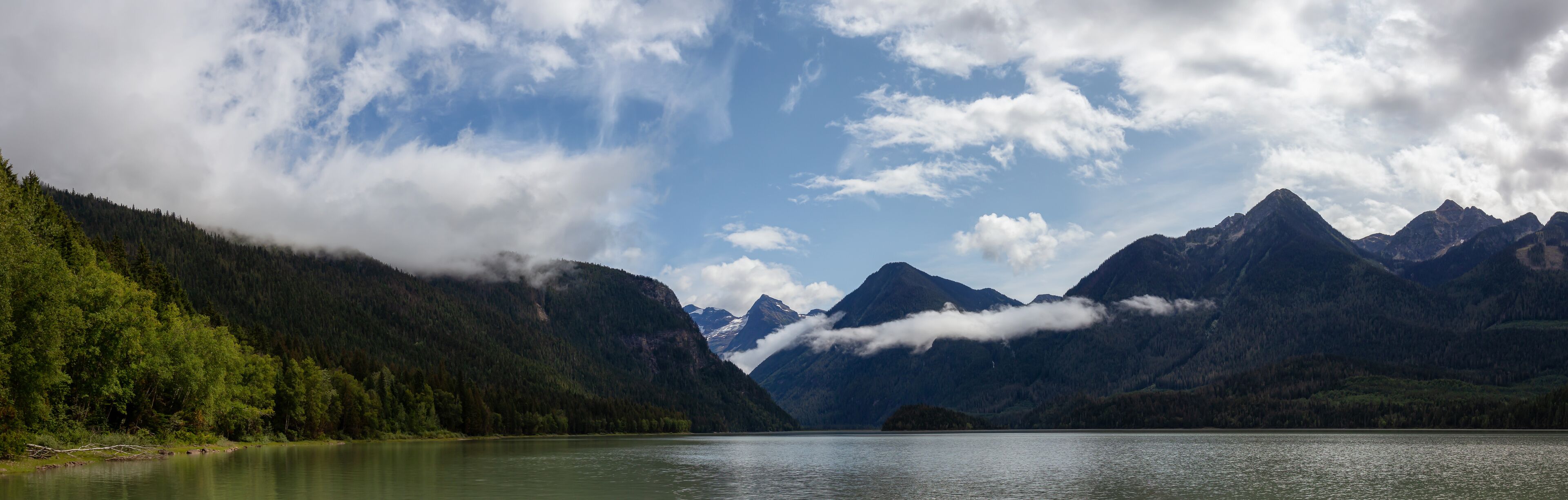 Beautiful Panoramic View of Mud Lake with Mountains in the background. Taken in Blue River, North of Kamloops, British Columbia, Canada.