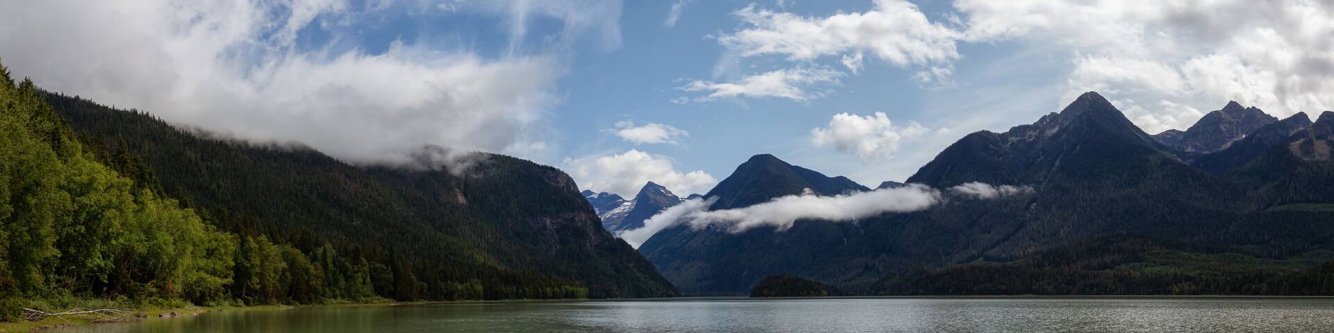 Beautiful Panoramic View of Mud Lake with Mountains in the background. Taken in Blue River, North of Kamloops, British Columbia, Canada.