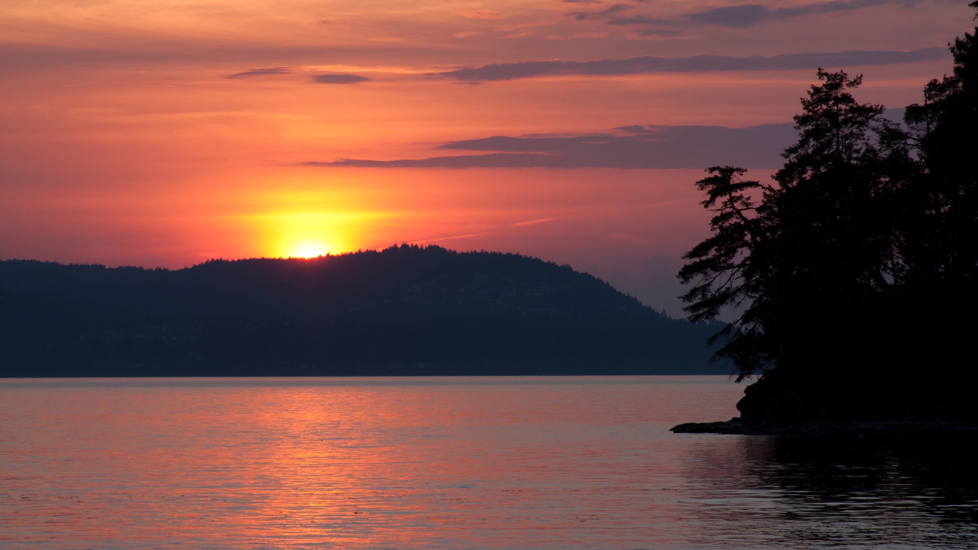 Gabriola Island featuring a bay or harbor and a sunset