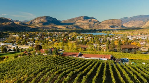 Oliver which includes a small town or village, farmland and landscape views