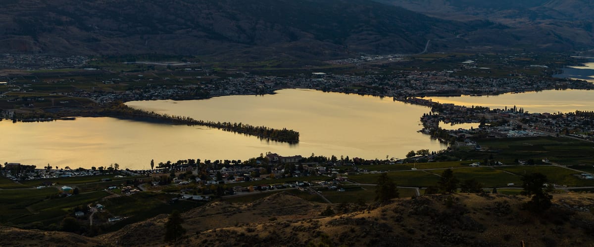 Osoyoos showing landscape views, a lake or waterhole and a sunset