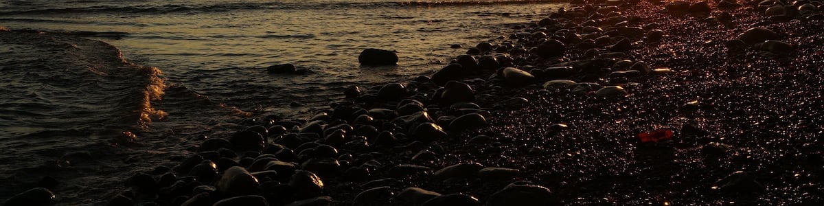 The quiet town of Qualicum Beach is one of those perfect places to watch the sunset, Sunshine reflecting on the water and wet rocks. The last bit of heat warming your face...sigh... #GoldenHour #AquaTrove