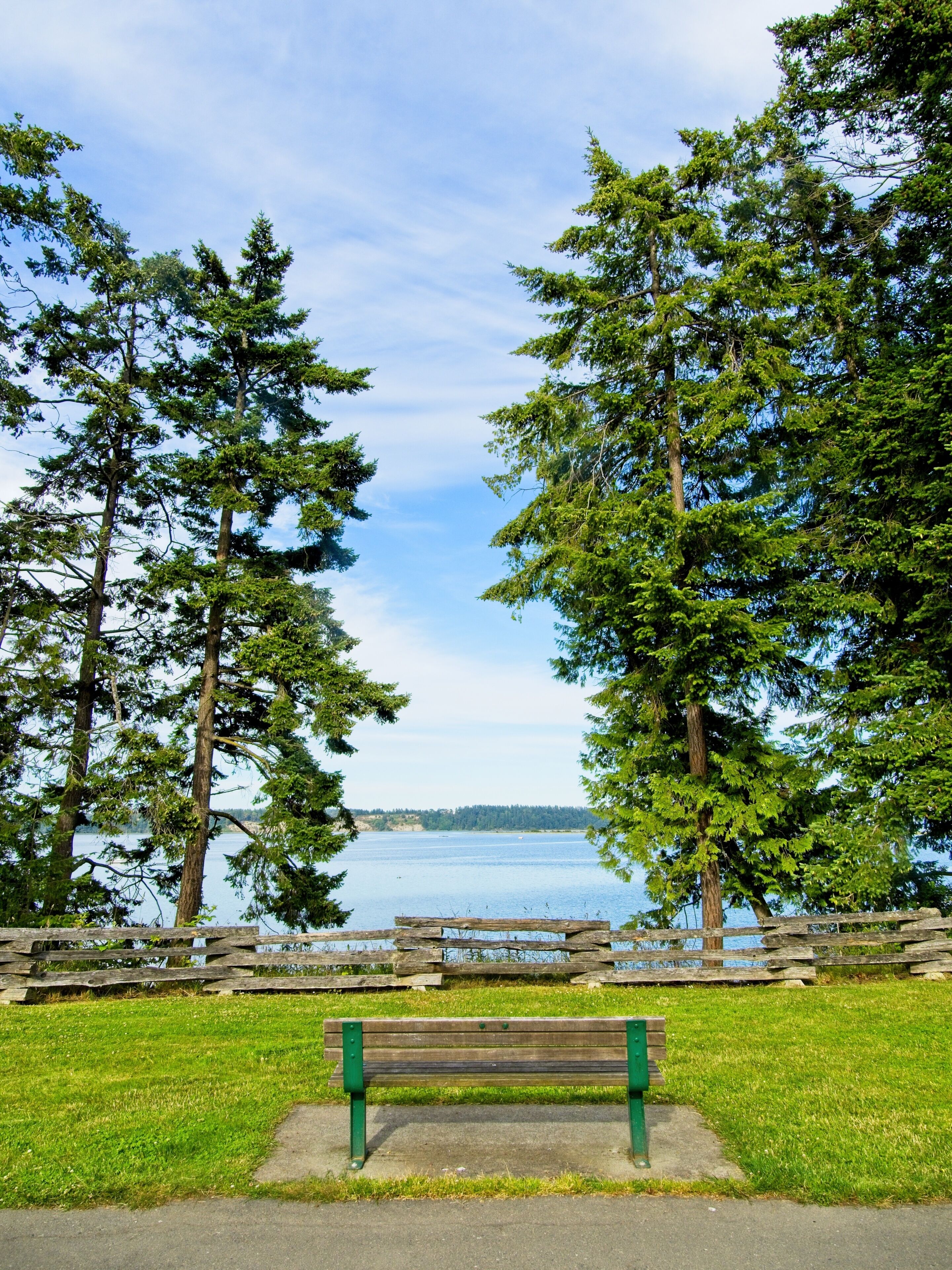 Park with bench overlooking the ocean in Saanichton on Vancouver Island, BC, Canada
