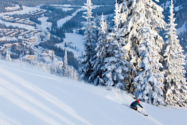 Sun Peaks featuring snow, a small town or village and snow skiing
