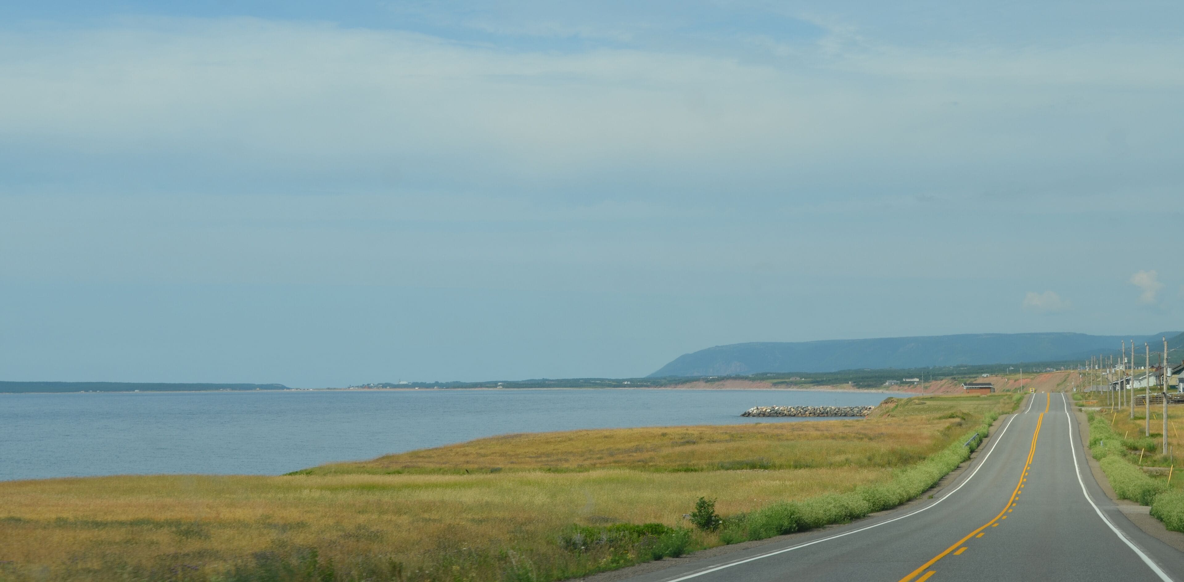 Summer in Nova Scotia: Grand Etang in the Foreground and Cheticamp Beach in the Distance on Cape Breton Island