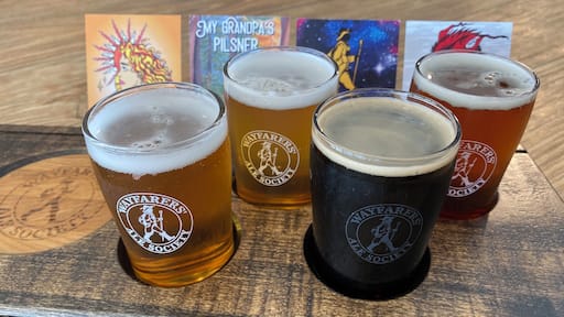 Wayfarer’s Ale Society in Port Williams, Nova Scotia has great craft beers with a keen focus on lagers and ales instead of just all hoppy craft beers. It also has the best views of the Cornwallis River influenced by the changing of the tides in the Bay of Fundy. You can buy tall boys or growlers to go or stay and enjoy a drink or flight with some tasty pizza, nachos or even a lobster roll.