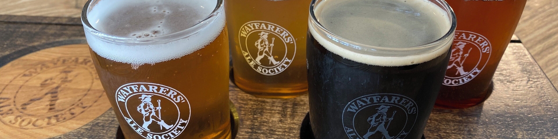 Wayfarer’s Ale Society in Port Williams, Nova Scotia has great craft beers with a keen focus on lagers and ales instead of just all hoppy craft beers. It also has the best views of the Cornwallis River influenced by the changing of the tides in the Bay of Fundy. You can buy tall boys or growlers to go or stay and enjoy a drink or flight with some tasty pizza, nachos or even a lobster roll.