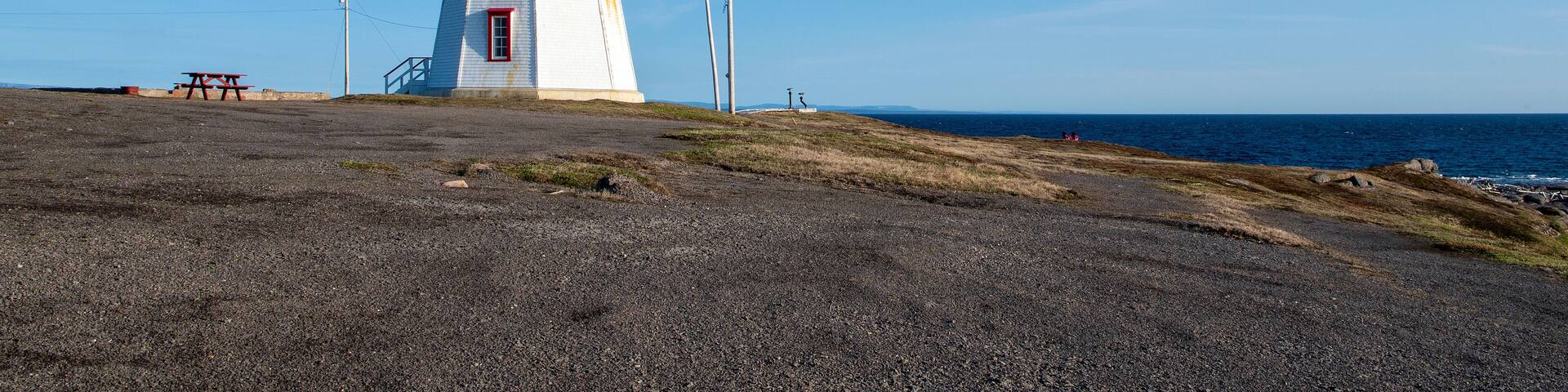 Point Riche Lighthouse sits at the western tip of the Point Riche peninsula near Port au Choix National Historic Site, overlooking the Gulf of St Lawrence.