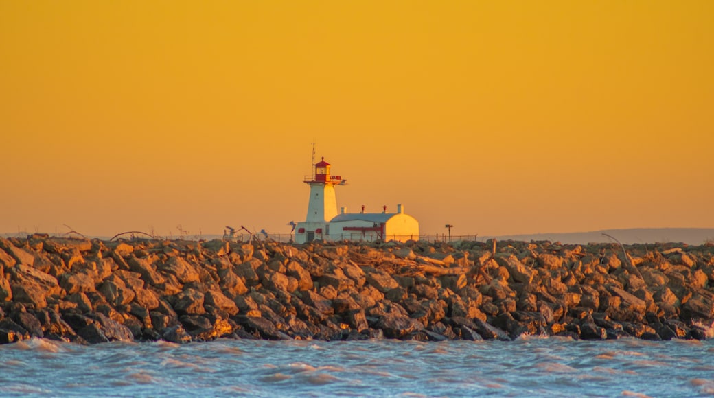 lighthouse at sunset in port colborne, canada