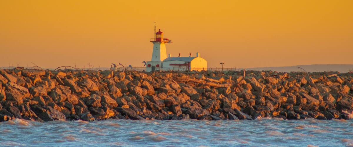 lighthouse at sunset in port colborne, canada
