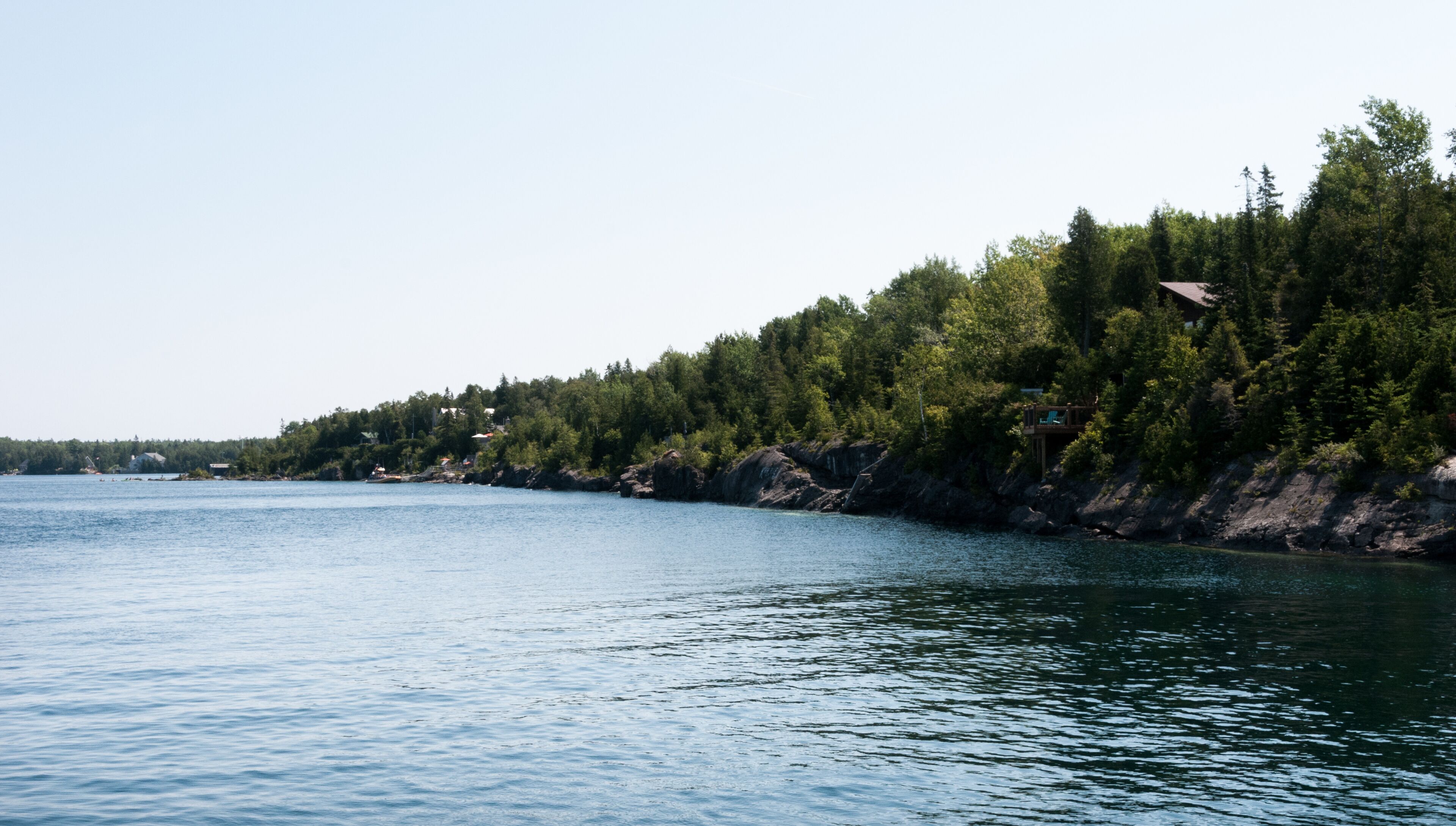 Wide, beautiful blue ocean with islands and clear water in Port Elgin, Ontario, Canada.