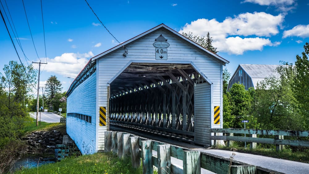 Anse St Jean covered bridge is spanning over the Matapedia river near Amqui in Quebec, Canada