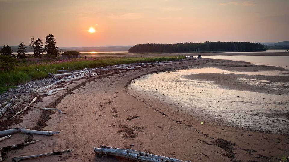 Sunset on the beach of Chandler (Quebec, Canada)