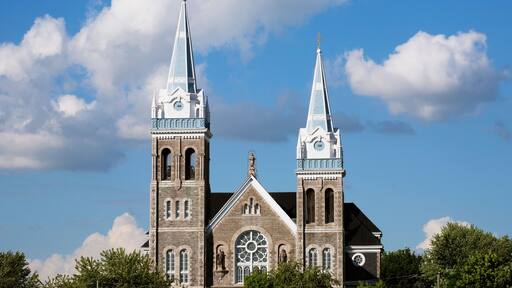 Church building with a bell tower and clock tower;Farnham quebec canada