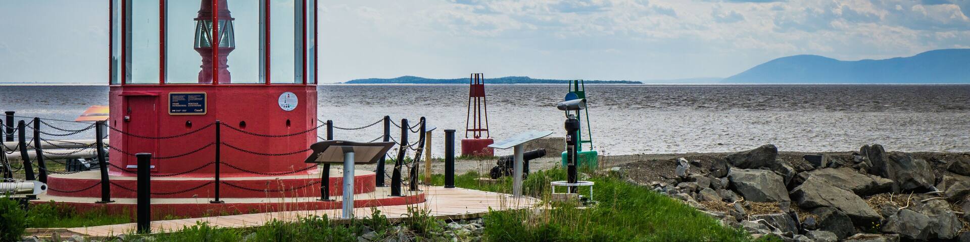 Red light located in the marina of St Jean Port Joli (Quebec, Canada), with a great view on the St Lawrence river