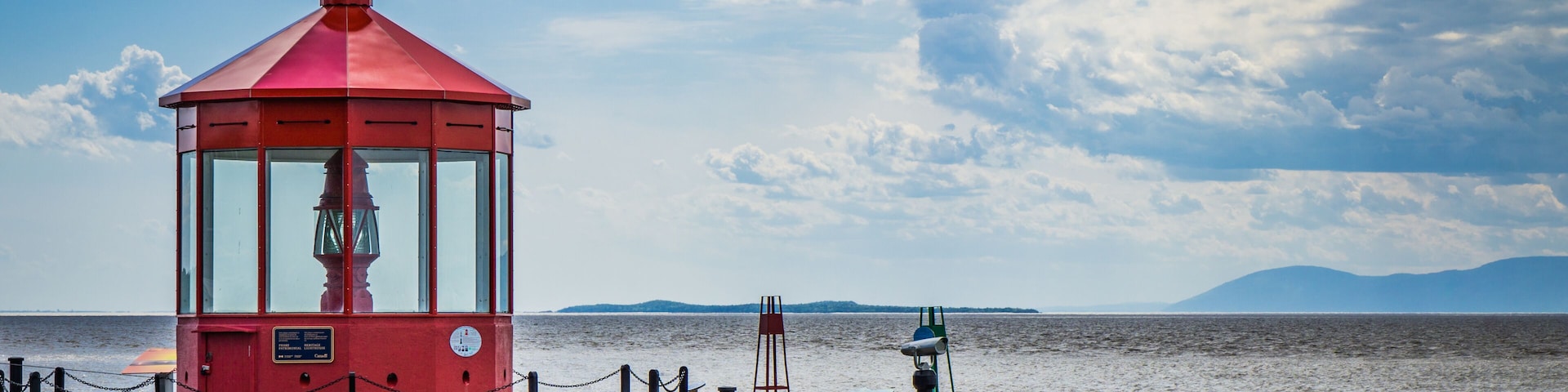 Red light located in the marina of St Jean Port Joli (Quebec, Canada), with a great view on the St Lawrence river