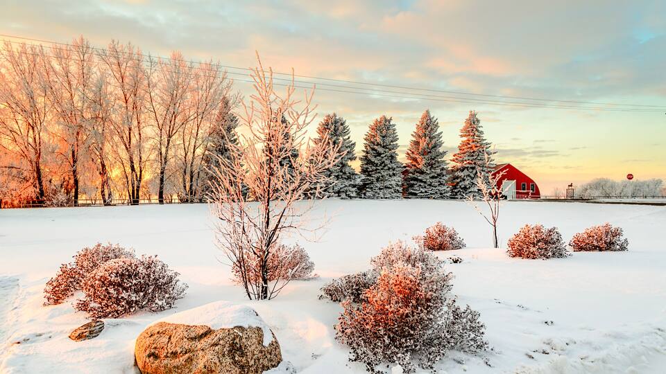 Winter sunset near the red barn