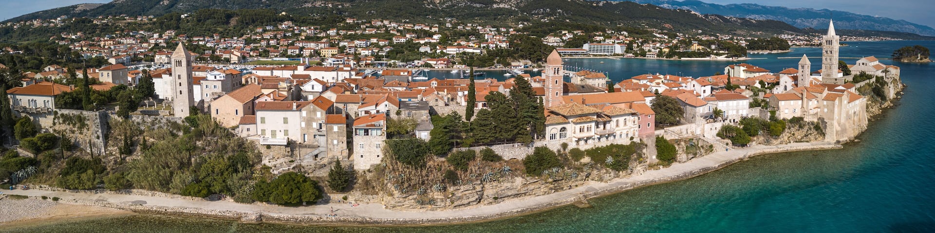 Aerial panorama picture of Rab city on the Rab Island, Croatia. Scenic view of Rab city surrounded by sea.
