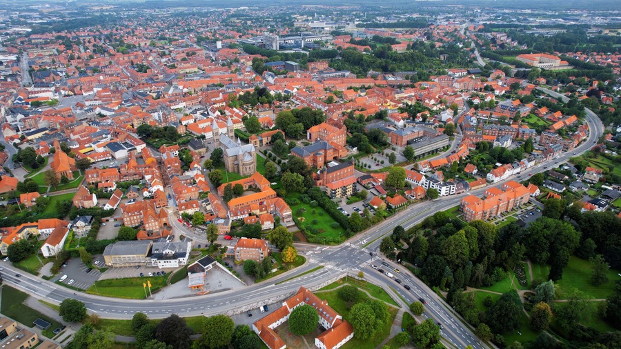 Aerial panorama of the old town of the city Viborg in Denmark on a cloudy summer morning.