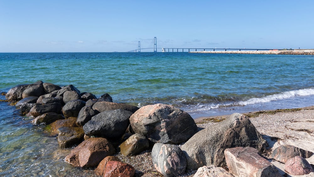 Panoramic view from Korsør to the East Bridge of Great Belt Fixed Link - Storebæltsbroen in Danish - a groyne in foreground´