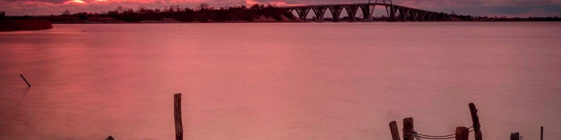 I was expecting a better sunrise this morning, but although there were too many clouds, and it was very cold and windy, this shot came out OK.