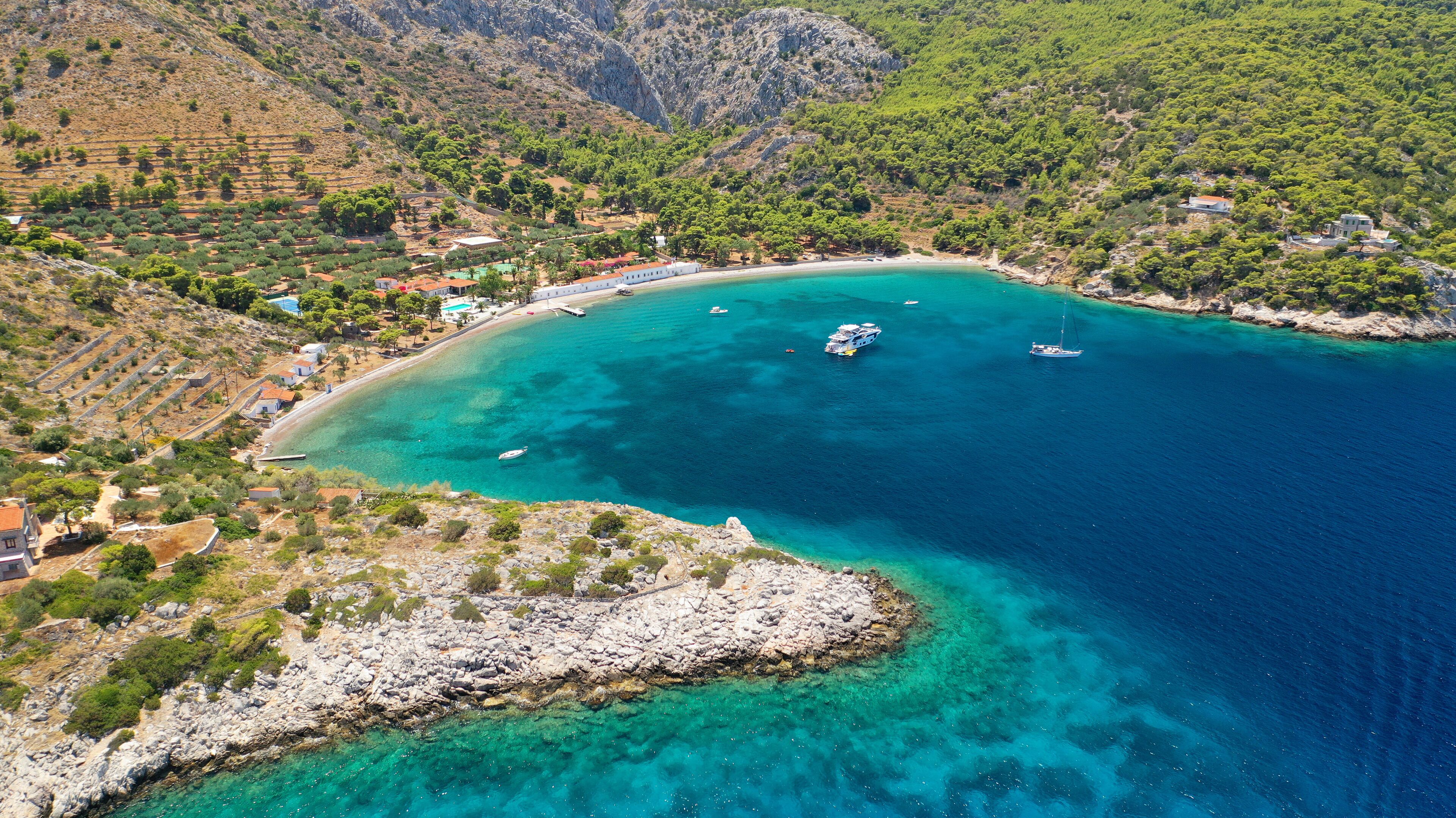 Aerial drone photo of small bay of Molos in picturesque island of Ydra or Hydra, Saronic gulf, Greece