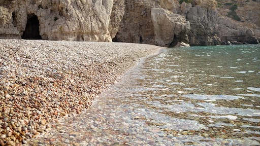 famous rocky beach of Traganou with iconic caves, Rhodes island, Dodecanese, Greece.view of the beautiful stones beach on the east coast of the island of Rhodes, Greece.Selective focus.