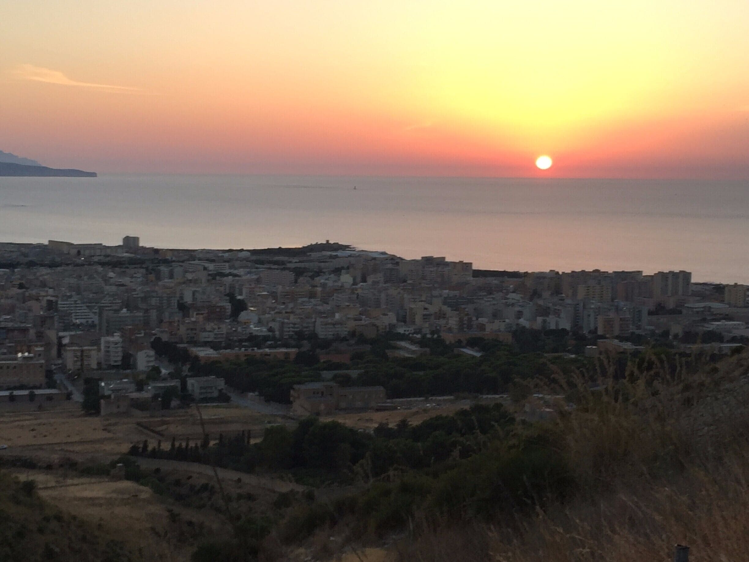 enjoy a perfect sunset with the sun falling into the see in front of Erice #lifeatexpedia