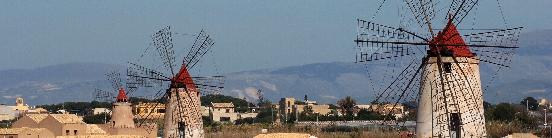 old windmill in sicily, marsala, trapani, italy