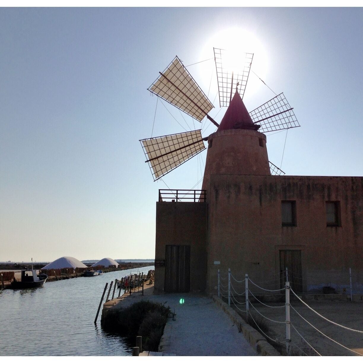 Wind mill at Mozia salt fields.
Mozia  is a small island, formerly known as Motia and San Pantaleo in the Trapani province, in Sicily, Italy, 