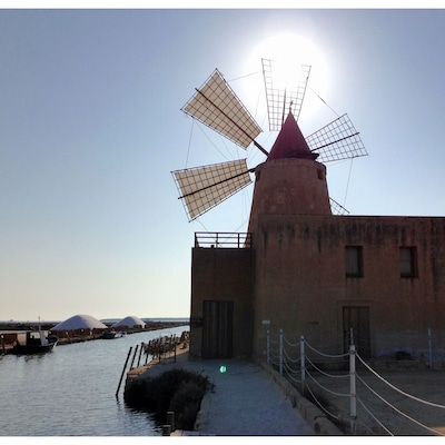 Wind mill at Mozia salt fields.
Mozia is a small island, formerly known as Motia and San Pantaleo in the Trapani province, in Sicily, Italy,