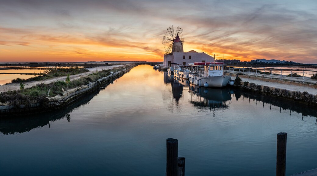 windmill in the salt flats at sunset, Stagnone Nature Reserve, Marsala , Trapani, Sicily, Italy, Europe