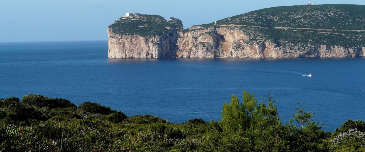 Capo Caccia seen from Punta Giglio, Sardinia, Italy.