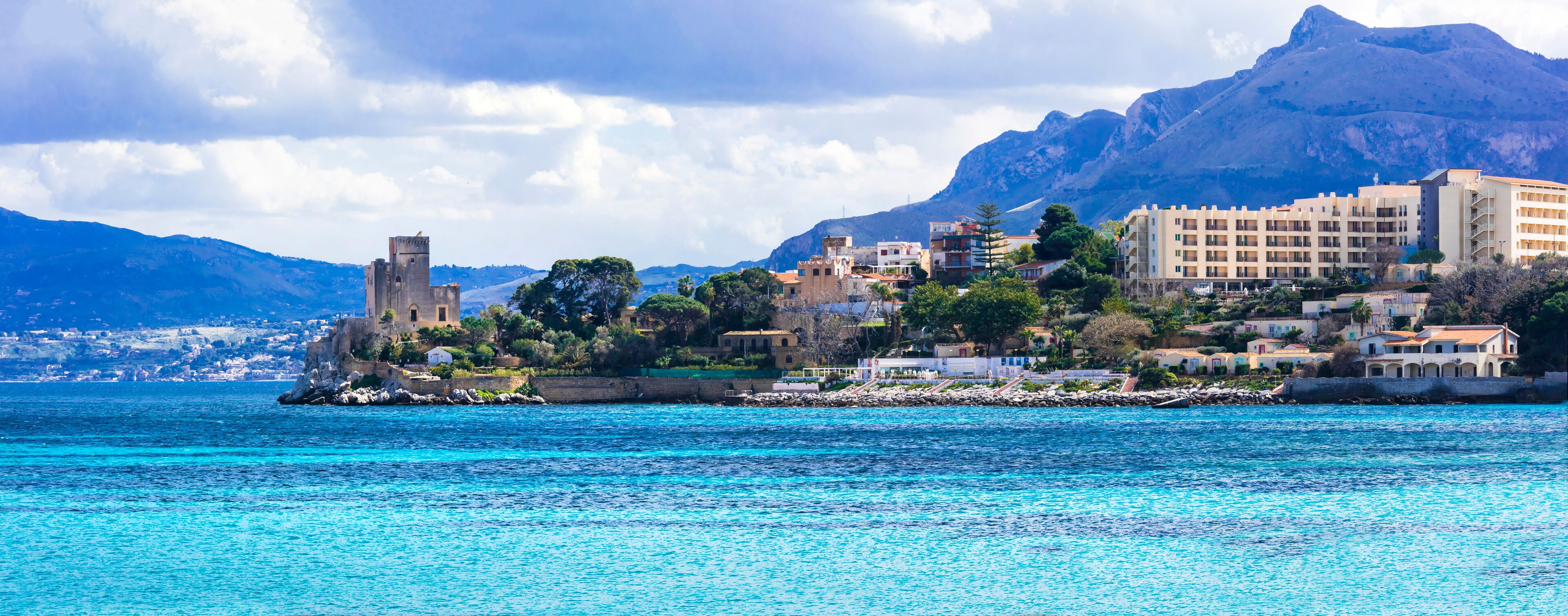 amazing picturesque small coastal town Santa Flavia with old castle . Sicily, Italy