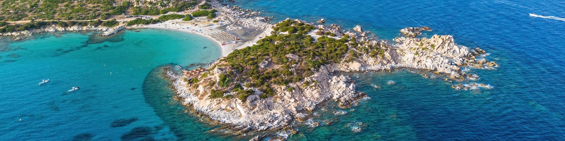 Aerial view of the beach of Punta Molentis, a sandy isthmus near Villasimius on the southeastern coast of Sardinia, an Italian island in the Mediterranean Sea