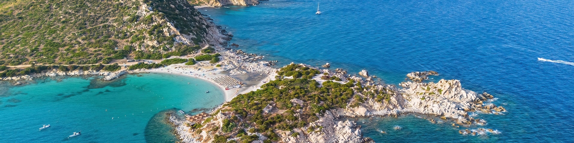Aerial view of the beach of Punta Molentis, a sandy isthmus near Villasimius on the southeastern coast of Sardinia, an Italian island in the Mediterranean Sea