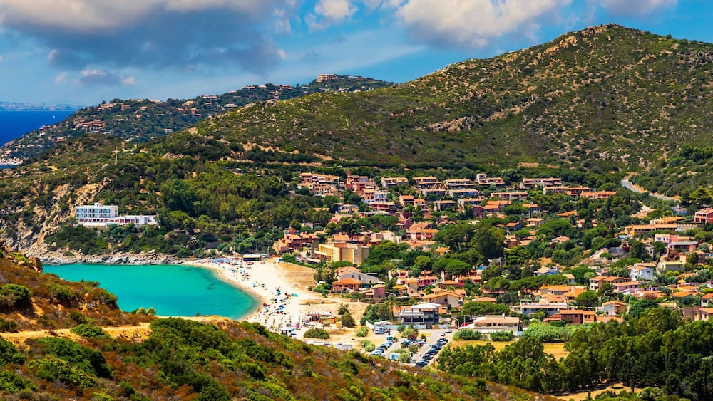 The beautiful turquoise water and white sand of Piscadeddus Beach, near Villasimius, Sardinia. The beautiful turquoise water and white sand of Piscadeddus Beach, near Villasimius, Sardinia.